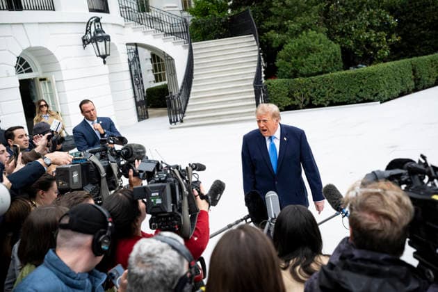 US President Donald J. Trump speaks to members of the media before boarding Marine One on the South Lawn of the White House in Washington, DC on October 3, 2026. President Trump visited his golf course in Virginia before a midterm campaign trip to Ohio later in the day.  WAX20261003879 GRAEMExSLOAN