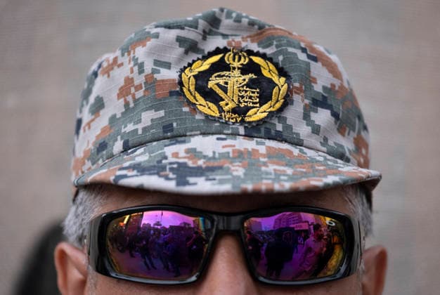 Opening Ceremony Of Second City-Square Military Training Camp A member of the Islamic Revolutionary Guard Corps (IRGC) stands guard during the opening ceremony of the second city-square military training camp for self-sacrificing forces in downtown Tehran, Iran, on October 3, 2026. The camp was established by the Basij paramilitary force, with personnel from the Islamic Republic of Iran Army responsible for training the volunteers. Tehran Tehran Iran  Copyright: xMortezaxNikoubazlx originalFilename: nikoubazl-openingc261003_np6Au.jpg
