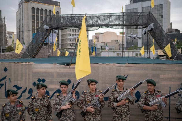 Opening Ceremony Of Second City-Square Military Training Camp Iranian schoolboys wearing military uniforms hold rifles during the opening ceremony of the second city-square military training camp for self-sacrificing forces in downtown Tehran, Iran, on October 3, 2026. The camp was established by the Basij paramilitary force, with personnel from the Islamic Republic of Iran Army responsible for training the volunteers. Tehran Tehran Iran  Copyright: xMortezaxNikoubazlx originalFilename: nikoubazl-openingc261003_nphM8.jpg