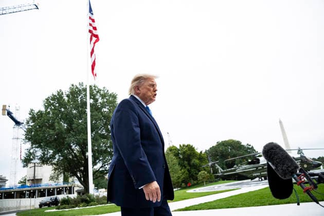 October 3, 2026, Washington, District Of Columbia, USA: United States President Donald J Trump speaks to members of the media before boarding Marine One on the South Lawn of the White House, in Washington, DC, USA, 3 October 2026. President Trump is traveling to Ohio for a rally as he campaigns with Republican Party candidates before midterm elections Washington USA  - ZUMAs152 20261003_faa_s152_006 Copyright: xGraemexSloan-PoolxviaxCNPx