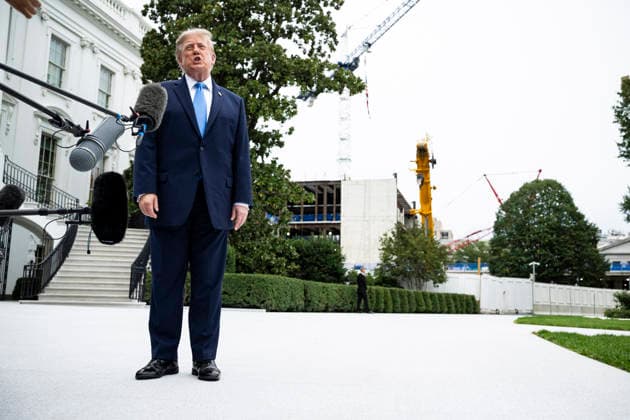 October 3, 2026, Washington, District Of Columbia, USA: United States President Donald J Trump speaks to members of the media before boarding Marine One on the South Lawn of the White House, in Washington, DC, USA, 3 October 2026. President Trump is traveling to Ohio for a rally as he campaigns with Republican Party candidates before midterm elections Washington USA - ZUMAs152 20261003_faa_s152_008 Copyright: xGraemexSloan-PoolxviaxCNPx