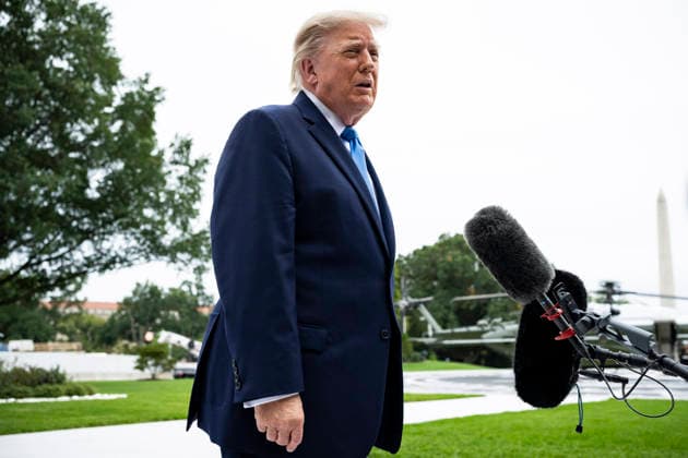 October 3, 2026, Washington, District Of Columbia, USA: United States President Donald J Trump speaks to members of the media before boarding Marine One on the South Lawn of the White House, in Washington, DC, USA, 3 October 2026. President Trump is traveling to Ohio for a rally as he campaigns with Republican Party candidates before midterm elections Washington USA  - ZUMAs152 20261003_faa_s152_034 Copyright: xGraemexSloan-PoolxviaxCNPx