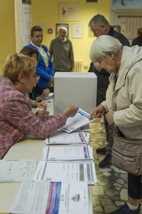 Voters cast ballots in Sarajevo as Bosnia and Herzegovina holds general elections SARAJEVO, BOSNIA AND HERZEGOVINA - OCTOBER 04: Voters cast their ballots as polling stations open for the 2026 General Elections in Sarajevo, Bosnia and Herzegovina on October 04, 2026. The nationwide vote features the inaugural use of new electoral technologies, including biometric voter identification, optical ballot scanners, and automated result transmission systems. Citizens are voting to elect members of the tripartite Presidency of Bosnia and Herzegovina, deputies to the Parliamentary Assembly, the Federation of BiH Parliament, the President and Vice Presidents of Republika Srpska, the National Assembly of Republika Srpska, and cantonal assemblies. Sami Copyright: x2026xAnadoluxSamirxJordamovicx