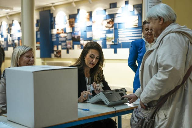Voters cast ballots in Sarajevo as Bosnia and Herzegovina holds general elections SARAJEVO, BOSNIA AND HERZEGOVINA - OCTOBER 04: Voters cast their ballots as polling stations open for the 2026 General Elections in Sarajevo, Bosnia and Herzegovina on October 04, 2026. The nationwide vote features the inaugural use of new electoral technologies, including biometric voter identification, optical ballot scanners, and automated result transmission systems. Citizens are voting to elect members of the tripartite Presidency of Bosnia and Herzegovina, deputies to the Parliamentary Assembly, the Federation of BiH Parliament, the President and Vice Presidents of Republika Srpska, the National Assembly of Republika Srpska, and cantonal assemblies. Sami Copyright: x2026xAnadoluxSamirxJordamovicx