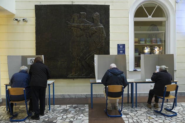 Voters cast ballots in Sarajevo as Bosnia and Herzegovina holds general elections SARAJEVO, BOSNIA AND HERZEGOVINA - OCTOBER 04: Voters cast their ballots as polling stations open for the 2026 General Elections in Sarajevo, Bosnia and Herzegovina on October 04, 2026. The nationwide vote features the inaugural use of new electoral technologies, including biometric voter identification, optical ballot scanners, and automated result transmission systems. Citizens are voting to elect members of the tripartite Presidency of Bosnia and Herzegovina, deputies to the Parliamentary Assembly, the Federation of BiH Parliament, the President and Vice Presidents of Republika Srpska, the National Assembly of Republika Srpska, and cantonal assemblies. Sami Copyright: x2026xAnadoluxSamirxJordamovicx