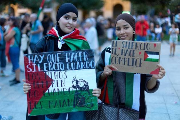 October 3, 2026, Pamplona, Spain: PAMPLONA, SPAIN, OCTOBER 3, 2026: Demonstrators take part in a pro-Palestinian march called by the citizens platform Yala Nafarroa in Pamplona. Protesters carried Palestinian flags and banners expressing solidarity with Gaza, including a large banner reading Stop Genocide, while participants also displayed messages calling for the protection of journalists. Pamplona Spain - ZUMAq101 20261003_zna_q101_129 Copyright: xUnaixBeroizx