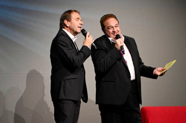 Peter Rütten und Oliver Kalkofe bei der Weltpremiere der ersten Folge der neuen SchleFaZ-Staffel auf Großbildleinwand Geisterjäger John Sinclair - Die Dämonenhochzeit im Ernst-Reuter-Saal. Berlin, 03.10.2026