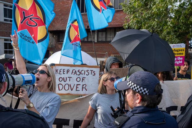 October 3, 2026, Dover, United Kingdom: Antifascist protesters holding placards and flags chant slogans during a counter-protest in Dover. Supporters of the English Defence League (EDL) gathered in Dover, UK to march through the town all the way to the harbour. English Defence League is an extreme far-right and Islamophobic organisation. It was founded by Tommy Robinson (pseudonym of Steven Yaxley-Lennon) in 2009. Dover United Kingdom - ZUMAs197 20261003_aaa_s197_252 Copyright: xKrisztianxElekx