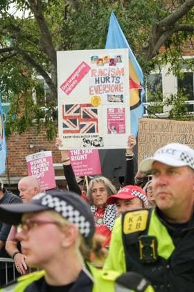 October 3, 2026, Dover, United Kingdom of Great Britain and Northern Ireland: DOVER, UNITED KINGDOM, OCTOBER 3, 2026: Anti-immigration protesters and anti-racism counter-protesters gather during rival demonstrations in Dover, Kent. Anti-immigration demonstrators carrying Union flags and St George s flags displayed banners calling for deportations and an end to small-boat crossings, while counter-protesters gathered nearby. Police maintained a significant presence between the groups and monitored the demonstrations. Dover United Kingdom of Great Britain and Northern Ireland - ZUMAq101 20261003_zna_q101_204 Copyright: xMarcxLewisx