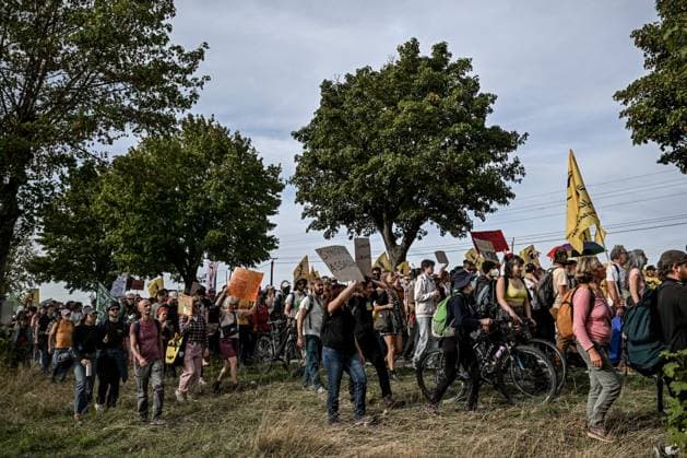 PROTEST AGAINST PESTICIDES PHOTOPQR OUEST FRANCE Martin ROCHE Saint Pierre la Garenne October 3, 2026 This Saturday, October 3, 2026, a protest against pesticides is being held in Saint-Pierre-la-Garenne, Eure, Normandy. In the massive procession, farmers, patients, healthcare workers, and citizens demanded the closure of production sites such as Syngenta’s. The rally was organized by an unprecedented coalition: the Confédération paysanne, Les Soulèvements de la Terre, the association Cancer Colère, and the Collectif de soutien aux victimes des pesticides de l’Ouest (CSVPO). Photographer: Martin ROCHE, Ouest France. Saint-Pierre-la-Garenne, October 3, 2026. On Saturday, October 3, 2026, a protest against pesticides was held in Saint-Pierre  Copyright: xPHOTOPQR OUESTxFRANCE MAXPPPxMartinxROCHEx 20261004OFR7257 20261004OFR7257
