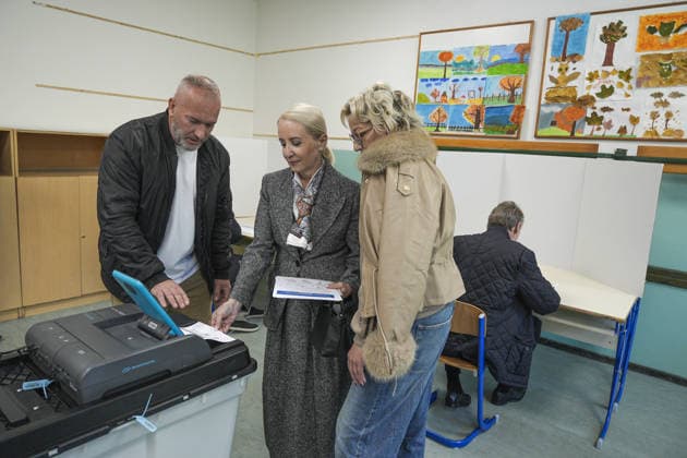 Bakir Izetbegovic casts his vote in Sarajevo SARAJEVO, BOSNIA AND HERZEGOVINA - OCTOBER 4: Bakir Izetbegovic (R), President of the Party of Democratic Action (SDA) and a candidate for the Presidency of Bosnia and Herzegovina, casts his vote accompanied by his wife, Sebija Izetbegovic (2nd L), at the polling station located at Nafija Sarajlic Elementary School in Sarajevo, Bosnia and Herzegovina, on October 4, 2026. Samir Jordamovic Anadolu Sarajevo Bosnia and Herzegovina. Editorial use only. Please get in touch for any other usage.  Copyright: x2026xAnadoluxSamirxJordamovicx