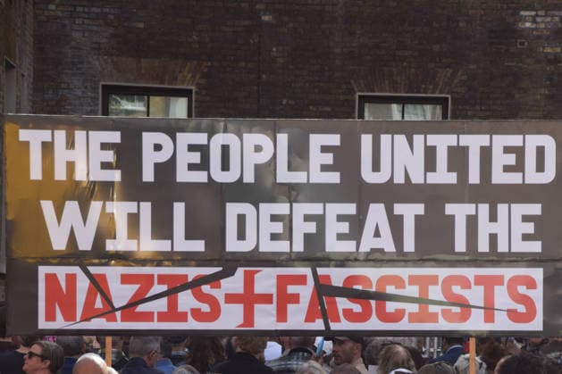 October 4, 2026, London, England, United Kingdom: Protesters gather in Whitechapel during the march to Cable Street against racism and fascism, marking the 90th anniversary since the Battle of Cable Street. London United Kingdom  - ZUMAv130 20261004_zip_v130_002 Copyright: xVukxValcicx