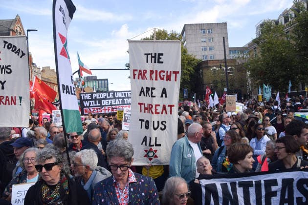 October 4, 2026, London, England, United Kingdom: Protesters gather in Whitechapel during the march to Cable Street against racism and fascism, marking the 90th anniversary since the Battle of Cable Street. London United Kingdom  - ZUMAv130 20261004_zip_v130_011 Copyright: xVukxValcicx
