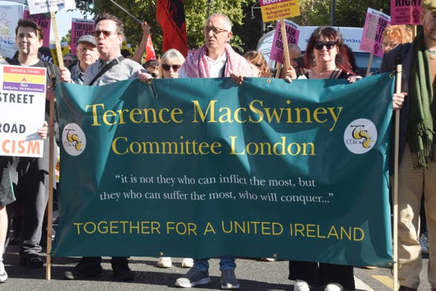 October 4, 2026, London, England, United Kingdom: Protesters hold a Terence MacSwiney Committee London banner stating Together for a united Ireland during the march to Cable Street against racism and fascism, marking the 90th anniversary since the Battle of Cable Street. London United Kingdom  - ZUMAv130 20261004_zip_v130_018 Copyright: xVukxValcicx