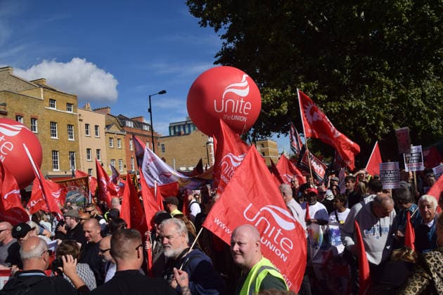 October 4, 2026, London, England, United Kingdom: Members of Unite the Union take part in the march to Cable Street against racism and fascism, marking the 90th anniversary since the Battle of Cable Street. London United Kingdom  - ZUMAv130 20261004_zip_v130_020 Copyright: xVukxValcicx