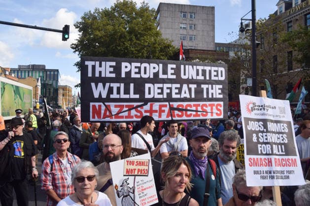October 4, 2026, London, England, United Kingdom: Protesters gather in Whitechapel during the march to Cable Street against racism and fascism, marking the 90th anniversary since the Battle of Cable Street. London United Kingdom - ZUMAv130 20261004_zip_v130_006 Copyright: xVukxValcicx