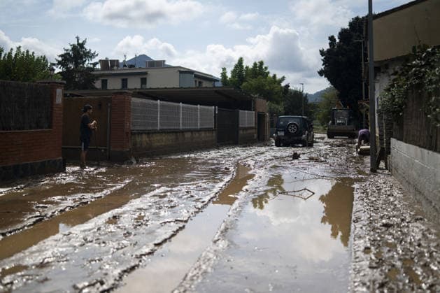 2 people killed as heavy rain hits parts of Spain BARCELONA, SPAIN - OCTOBER 4: Floodwaters submerge streets following severe torrential rainfall in Montornes del Valles, Barcelona, Spain on October 4, 2026. Heavy rains triggered widespread flooding across Catalonia, leaving at least two people dead and one missing as emergency services responded to widespread disruptions. Lorena Sopena Lopez Anadolu Barcelona Spain. Editorial use only. Please get in touch for any other usage.  Copyright: x2026xAnadoluxLorenaxSopenaxLopezx
