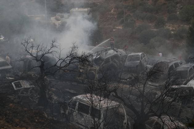 Israeli Settlers Set Fire To Olive Trees And Car Scrap Yard Near Silwad SILWAD, WEST BANK, PALESTINE OCTOBER 4, 2026: Israeli settlers set fire to olive trees and a car scrap yard between the villages of Ein Yabrud and Silwad, according to the information provided. The owner of the repair shop said more than 50 cars were destroyed in the fire. The incident occurred amid ongoing attacks targeting Palestinian property and agricultural land in the area. Fires affecting olive trees and other Palestinian property have also been reported in areas around Silwad. Ramallah Palestine, State of Copyright: x xSalmanxMohsenxAlkhatibx xJNAxPressx