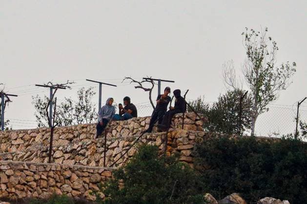 Israeli Settlers Set Fire To Olive Trees And Car Scrap Yard Near Silwad SILWAD, WEST BANK, PALESTINE OCTOBER 4, 2026: Israeli settlers set fire to olive trees and a car scrap yard between the villages of Ein Yabrud and Silwad, according to the information provided. The owner of the repair shop said more than 50 cars were destroyed in the fire. The incident occurred amid ongoing attacks targeting Palestinian property and agricultural land in the area. Fires affecting olive trees and other Palestinian property have also been reported in areas around Silwad. Ramallah Palestine, State of Copyright: x xSalmanxMohsenxAlkhatibx xJNAxPressx