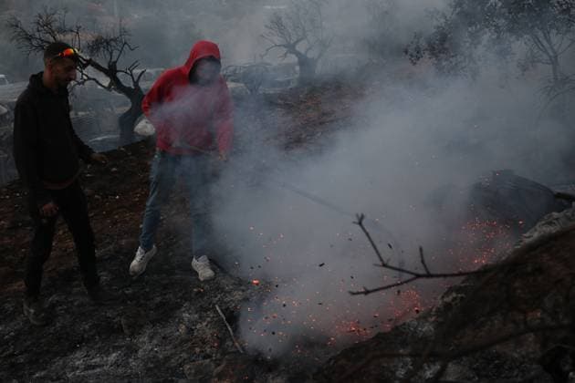Israeli Settlers Set Fire To Olive Trees And Car Scrap Yard Near Silwad SILWAD, WEST BANK, PALESTINE OCTOBER 4, 2026: Israeli settlers set fire to olive trees and a car scrap yard between the villages of Ein Yabrud and Silwad, according to the information provided. The owner of the repair shop said more than 50 cars were destroyed in the fire. The incident occurred amid ongoing attacks targeting Palestinian property and agricultural land in the area. Fires affecting olive trees and other Palestinian property have also been reported in areas around Silwad. Ramallah Palestine, State of Copyright: x xSalmanxMohsenxAlkhatibx xJNAxPressx
