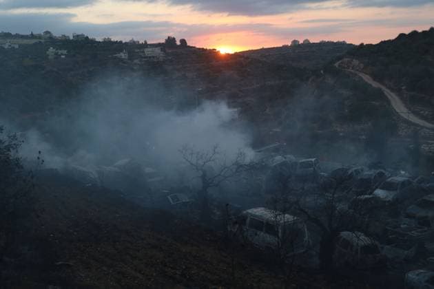 Israeli Settlers Set Fire To Olive Trees And Car Scrap Yard Near Silwad SILWAD, WEST BANK, PALESTINE OCTOBER 4, 2026: Israeli settlers set fire to olive trees and a car scrap yard between the villages of Ein Yabrud and Silwad, according to the information provided. The owner of the repair shop said more than 50 cars were destroyed in the fire. The incident occurred amid ongoing attacks targeting Palestinian property and agricultural land in the area. Fires affecting olive trees and other Palestinian property have also been reported in areas around Silwad. Ramallah Palestine, State of Copyright: x xSalmanxMohsenxAlkhatibx xJNAxPressx