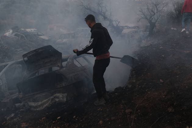 Israeli Settlers Set Fire To Olive Trees And Car Scrap Yard Near Silwad SILWAD, WEST BANK, PALESTINE OCTOBER 4, 2026: Israeli settlers set fire to olive trees and a car scrap yard between the villages of Ein Yabrud and Silwad, according to the information provided. The owner of the repair shop said more than 50 cars were destroyed in the fire. The incident occurred amid ongoing attacks targeting Palestinian property and agricultural land in the area. Fires affecting olive trees and other Palestinian property have also been reported in areas around Silwad. Ramallah Palestine, State of Copyright: x xSalmanxMohsenxAlkhatibx xJNAxPressx