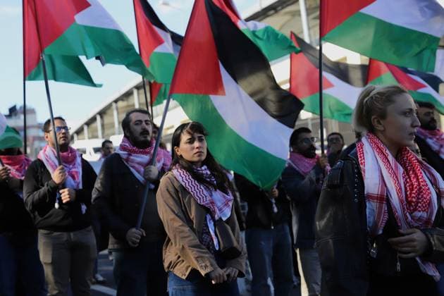 Pro-Palestinian Protesters March Through Istanbul ISTANBUL, TURKIYE, OCTOBER 4, 2026: Demonstrators from left-wing and socialist organizations march from Taksim toward Dolmabahce in Istanbul in solidarity with Palestinians. Participants carried Palestinian flags and chanted slogans while protesting Israel™s military operations in Gaza and calling attention to the humanitarian situation facing Palestinians. Istanbul Türkiye Copyright: x xDilaraxAcikgozx xJNAxPressx
