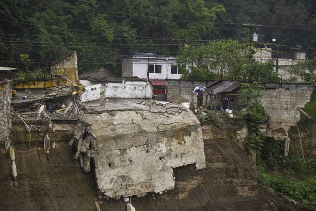 Heavy rains linked to El Nino trigger severe land collapse in Guatemala SAN MIGUEL PETAPA, GUATEMALA - OCTOBER 04: The Pinula River surges following relentless rainfall linked to the El Nino phenomenon, triggering severe erosion and the collapse of homes in the Villa Hermosa I neighborhood of San Miguel Petapa, Guatemala on October 04, 2026. Official reports indicate extensive structural damage and continuous land loss, exacerbating years of riverbank erosion and placing neighboring residential properties at critical risk as heavy precipitation and scouring persist. Luis Vargas Anadolu San Miguel Petapa Guatemala. Editorial use only. Please get in touch for any other usage.  Copyright: x2026xAnadoluxLuisxVargasx