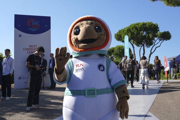 World’s largest annual gathering dedicated to space opens in Turkiye’s Antalya ANTALYA, TURKIYE - OCTOBER 05: Turquoise, the official Caretta caretta mascot of the 77th International Astronautical Congress (IAC), interacts with delegates during the opening day of the global summit at the NEST Convention Center in Antalya, Turkiye on October 05, 2026. Organized by the International Astronautical Federation (IAF), coordinated by the Turkish Ministry of Industry and Technology, and co-hosted by the Turkish Space Agency (TUA) and SAHA Istanbul, the event features the mascot welcoming space professionals and attendees from around the world. Beyza Comert Anadolu Antalya Turkey. Editorial use only. Please get in touch for any other usage.  Copyright: x2026xAnadoluxBeyzaxComertx