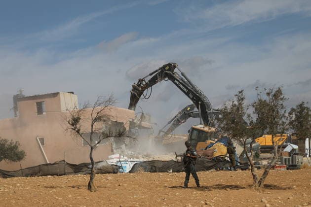 Israeli Army Demolishes Palestinian Building South of Hebron Israeli army vehicles demolish a Palestinian building in the village of al-Deirat near Yatta, south of Hebron, in the West Bank, on October 5, 2026, as Israeli forces deploy around the site and Palestinians watch the demolition. Photo by Mamoun Wazwaz apaimages Hebron West Bank Palestinian Territory 051026_Hebron_MW_00(14) Copyright: xapaimagesxMamounxWazwazx xapaimagesx