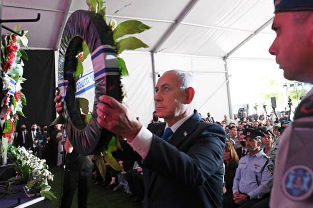 Israeli Prime Minister Benjamin Netanyahu lays a wreath at the State Memorial Ceremony for the three year anniversary of the October 7, 2023, Hamas attack, in remembrance of Israel Defense Forces and security members who fell in the War of Redemption in the Mt. Herzl Cemetery, Jerusalem, on Monday, October 5, 2026.  JER2026100513 DEBBIExHILL