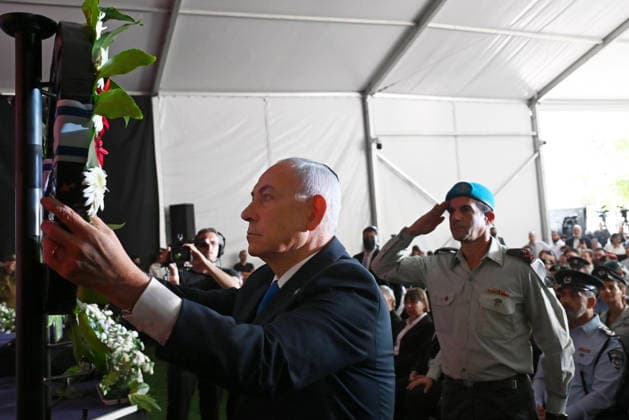 Israeli Prime Minister Benjamin Netanyahu lays a wreath at the State Memorial Ceremony for the three year anniversary of the October 7, 2023, Hamas attack, in remembrance of Israel Defense Forces and security members who fell in the War of Redemption in the Mt. Herzl Cemetery, Jerusalem, on Monday, October 5, 2026.  JER2026100514 DEBBIExHILL