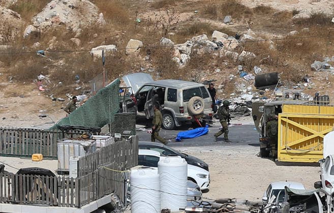 Israeli fire kills one Palestinian, injures two in West Bank, Palestine WEST BANK, PALESTINE - OCTOBER 05: Israeli soldiers and military vehicles are deployed near the entrance to Bani Naim, east of Hebron, after troops opened fire on a moving vehicle, on October 05, 2026 in West Bank, Palestine. One Palestinian was killed and two young Palestinians were injured in the shooting. Israeli forces later secured the area and carried out an inspection, while separate attacks by Israeli settlers elsewhere in West Bank left additional Palestinians injured. Wisam Hashlamoun Anadolu Hebron West Bank. Editorial use only. Please get in touch for any other usage.  Copyright: x2026xAnadoluxWisamxHashlamounx