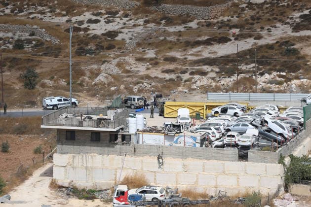 Israeli fire kills one Palestinian, injures two in West Bank, Palestine WEST BANK, PALESTINE - OCTOBER 05: Israeli soldiers and military vehicles are deployed near the entrance to Bani Naim, east of Hebron, after troops opened fire on a moving vehicle, on October 05, 2026 in West Bank, Palestine. One Palestinian was killed and two young Palestinians were injured in the shooting. Israeli forces later secured the area and carried out an inspection, while separate attacks by Israeli settlers elsewhere in West Bank left additional Palestinians injured. Wisam Hashlamoun Anadolu Hebron West Bank. Editorial use only. Please get in touch for any other usage.  Copyright: x2026xAnadoluxWisamxHashlamounx