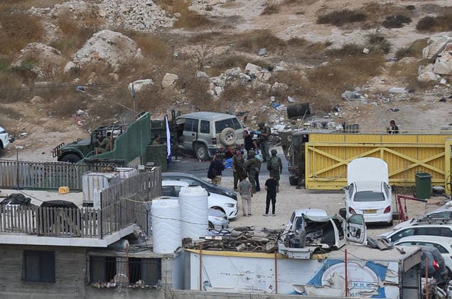 Israeli fire kills one Palestinian, injures two in West Bank, Palestine WEST BANK, PALESTINE - OCTOBER 05: Israeli soldiers and military vehicles are deployed near the entrance to Bani Naim, east of Hebron, after troops opened fire on a moving vehicle, on October 05, 2026 in West Bank, Palestine. One Palestinian was killed and two young Palestinians were injured in the shooting. Israeli forces later secured the area and carried out an inspection, while separate attacks by Israeli settlers elsewhere in West Bank left additional Palestinians injured. Wisam Hashlamoun Anadolu Hebron West Bank. Editorial use only. Please get in touch for any other usage.  Copyright: x2026xAnadoluxWisamxHashlamounx