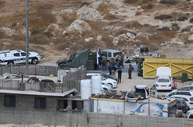 Israeli fire kills one Palestinian, injures two in West Bank, Palestine WEST BANK, PALESTINE - OCTOBER 05: Israeli soldiers and military vehicles are deployed near the entrance to Bani Naim, east of Hebron, after troops opened fire on a moving vehicle, on October 05, 2026 in West Bank, Palestine. One Palestinian was killed and two young Palestinians were injured in the shooting. Israeli forces later secured the area and carried out an inspection, while separate attacks by Israeli settlers elsewhere in West Bank left additional Palestinians injured. Wisam Hashlamoun Anadolu Hebron West Bank. Editorial use only. Please get in touch for any other usage.  Copyright: x2026xAnadoluxWisamxHashlamounx