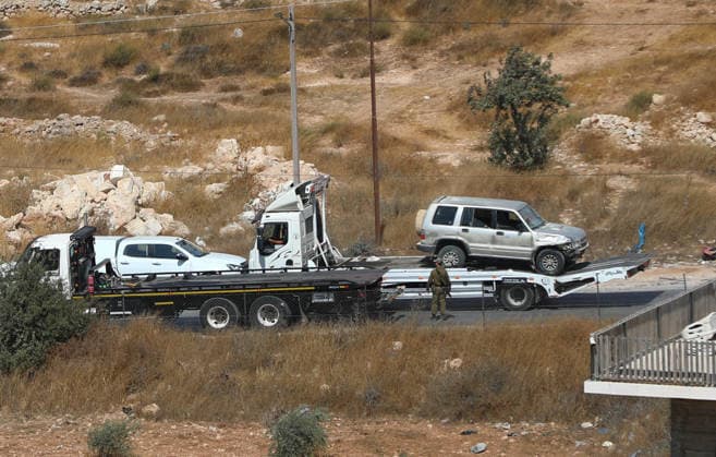 Israeli fire kills one Palestinian, injures two in West Bank, Palestine WEST BANK, PALESTINE - OCTOBER 05: Israeli soldiers and military vehicles are deployed near the entrance to Bani Naim, east of Hebron, after troops opened fire on a moving vehicle, on October 05, 2026 in West Bank, Palestine. One Palestinian was killed and two young Palestinians were injured in the shooting. Israeli forces later secured the area and carried out an inspection, while separate attacks by Israeli settlers elsewhere in West Bank left additional Palestinians injured. Wisam Hashlamoun Anadolu Hebron West Bank. Editorial use only. Please get in touch for any other usage.  Copyright: x2026xAnadoluxWisamxHashlamounx