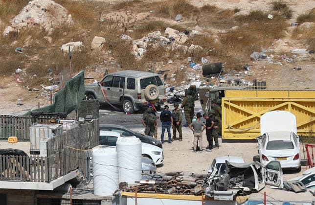 Israeli fire kills one Palestinian, injures two in West Bank, Palestine WEST BANK, PALESTINE - OCTOBER 05: Israeli soldiers and military vehicles are deployed near the entrance to Bani Naim, east of Hebron, after troops opened fire on a moving vehicle, on October 05, 2026 in West Bank, Palestine. One Palestinian was killed and two young Palestinians were injured in the shooting. Israeli forces later secured the area and carried out an inspection, while separate attacks by Israeli settlers elsewhere in West Bank left additional Palestinians injured. Wisam Hashlamoun Anadolu Hebron West Bank. Editorial use only. Please get in touch for any other usage.  Copyright: x2026xAnadoluxWisamxHashlamounx