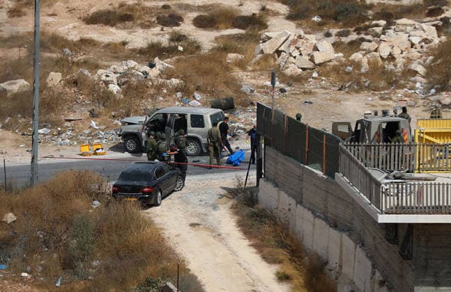 Israeli fire kills one Palestinian, injures two in West Bank, Palestine WEST BANK, PALESTINE - OCTOBER 05: Israeli soldiers and military vehicles are deployed near the entrance to Bani Naim, east of Hebron, after troops opened fire on a moving vehicle, on October 05, 2026 in West Bank, Palestine. One Palestinian was killed and two young Palestinians were injured in the shooting. Israeli forces later secured the area and carried out an inspection, while separate attacks by Israeli settlers elsewhere in West Bank left additional Palestinians injured. Wisam Hashlamoun Anadolu Hebron West Bank. Editorial use only. Please get in touch for any other usage.  Copyright: x2026xAnadoluxWisamxHashlamounx
