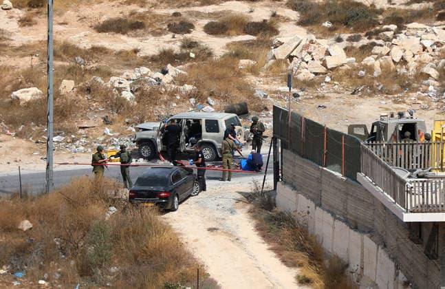 Israeli fire kills one Palestinian, injures two in West Bank, Palestine WEST BANK, PALESTINE - OCTOBER 05: Israeli soldiers and military vehicles are deployed near the entrance to Bani Naim, east of Hebron, after troops opened fire on a moving vehicle, on October 05, 2026 in West Bank, Palestine. One Palestinian was killed and two young Palestinians were injured in the shooting. Israeli forces later secured the area and carried out an inspection, while separate attacks by Israeli settlers elsewhere in West Bank left additional Palestinians injured. Wisam Hashlamoun Anadolu Hebron West Bank. Editorial use only. Please get in touch for any other usage.  Copyright: x2026xAnadoluxWisamxHashlamounx