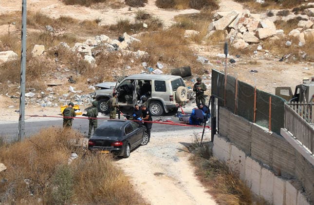 Israeli fire kills one Palestinian, injures two in West Bank, Palestine WEST BANK, PALESTINE - OCTOBER 05: Israeli soldiers and military vehicles are deployed near the entrance to Bani Naim, east of Hebron, after troops opened fire on a moving vehicle, on October 05, 2026 in West Bank, Palestine. One Palestinian was killed and two young Palestinians were injured in the shooting. Israeli forces later secured the area and carried out an inspection, while separate attacks by Israeli settlers elsewhere in West Bank left additional Palestinians injured. Wisam Hashlamoun Anadolu Hebron West Bank. Editorial use only. Please get in touch for any other usage.  Copyright: x2026xAnadoluxWisamxHashlamounx