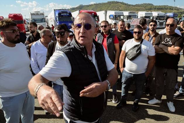 October 5, 2026, Catanzaro, Catanzaro, Italy: Vincenzo Laudari (C), truck driver, during the protest of a group of truck drivers, traders and representatives of the agricultural sector who gathered to protest against the high cost of living and fuel at the headquarters of the Regional Citadel in Catanzaro, 05 10 2026 Catanzaro Italy  - ZUMAa289 20261005_zia_a289_057 Copyright: xValeriaxFerrarox xAgfx