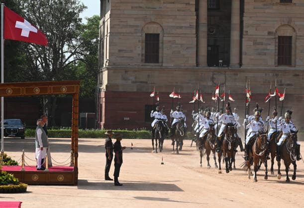 NEW DELHI, INDIA - OCTOBER 5: President Droupadi Murmu and Prime Minister Narendra Modi during a ceremonial reception for President of the Swiss Confederation Guy Parmelin and his spouse Caroline Parmelin inspecting guard of honour at Rashtrapati Bhavan, on October 5, 2026 in New Delhi, India. Swiss President in on official three-day State visit to India from October 5 to 7 at the invitation of Prime Minister Modi. Accompanied by a high-level business and government delegation, President Parmelin is scheduled to participate in bilateral summit talks at Hyderabad House to expand trade, investment, and technological cooperation under the India-European Free Trade Association (EFTA) Trade and Economic Partnership Agreement (TEPA). (Photo by S