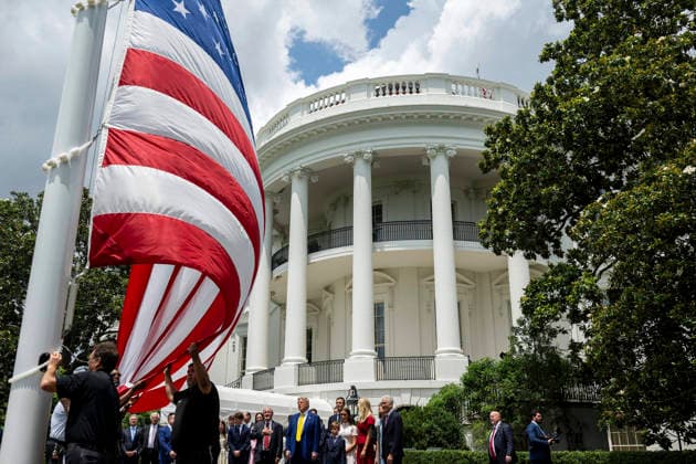 October 5, 2026, Washington, Dc, United States of America: An American flag is raised on a newly installed flagpole on the South Lawn of the White House as U.S. President Donald Trump, family members and guests look on, June 18, 2025 in Washington, D.C. The flag was raised on one of two new flagpoles Trump had installed on the North and South Lawns of the White House, which he said he paid for personally. Washington United States of America - ZUMAp138 20261005_zaa_p138_095 Copyright: xDanielxTorok WhitexHousex