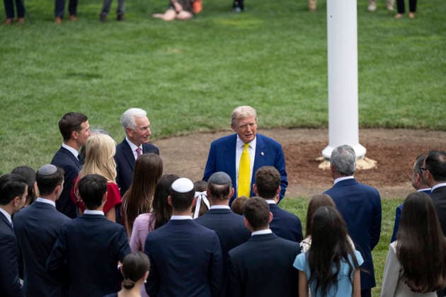 October 5, 2026, Washington, Dc, United States of America: U.S. President Donald Trump speaks with guests at the base of the newly installed flagpole on the South Lawn of the White House, June 18, 2025 in Washington, D.C. The flag was raised on one of two new flagpoles Trump had installed on the North and South Lawns of the White House, which he said he paid for personally. Washington United States of America - ZUMAp138 20261005_zaa_p138_086 Copyright: xMollyxRiley WhitexHousex