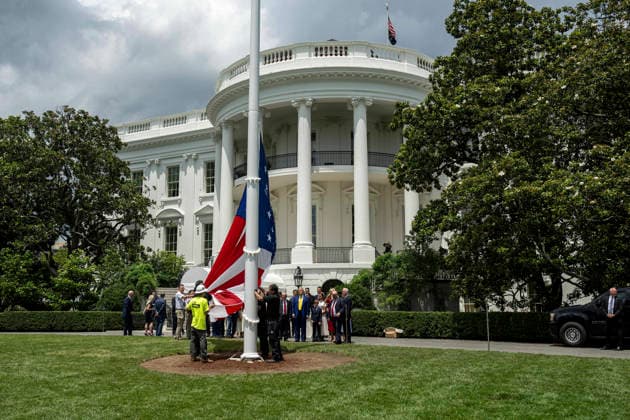 October 5, 2026, Washington, Dc, United States of America: An American flag is raised on a newly installed flagpole on the South Lawn of the White House as U.S. President Donald Trump, family members and guests look on, June 18, 2025 in Washington, D.C. The flag was raised on one of two new flagpoles Trump had installed on the North and South Lawns of the White House, which he said he paid for personally. Washington United States of America - ZUMAp138 20261005_zaa_p138_088 Copyright: xDanielxTorok WhitexHousex