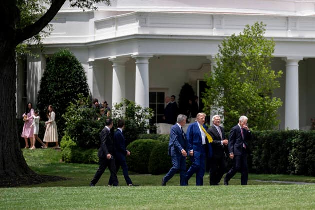 October 5, 2026, Washington, Dc, United States of America: U.S. President Donald Trump walks with guests across the South Lawn of the White House for a flag raising on a newly installed flagpole, June 18, 2025 in Washington, D.C. The flag was raised on one of two new flagpoles Trump had installed on the North and South Lawns of the White House, which he said he paid for personally. Washington United States of America - ZUMAp138 20261005_zaa_p138_079 Copyright: xMollyxRiley WhitexHousex