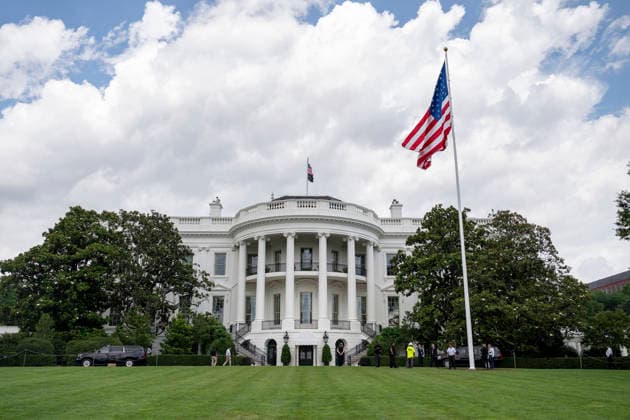 October 5, 2026, Washington, Dc, United States of America: An American flag flies from a newly installed flagpole on the South Lawn of the White House, June 18, 2025 in Washington, D.C. The flag was raised on one of two new flagpoles Trump had installed on the North and South Lawns of the White House, which he said he paid for personally. Washington United States of America - ZUMAp138 20261005_zaa_p138_063 Copyright: xMollyxRiley WhitexHousex