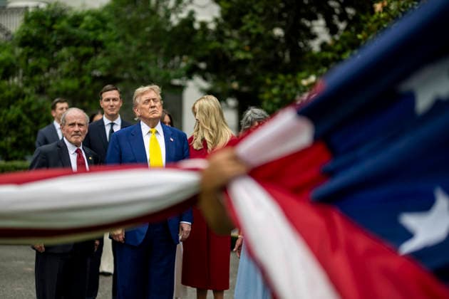 October 5, 2026, Washington, Dc, United States of America: U.S. President Donald Trump watches as workers unfurl an American flag to be raised on a newly installed flagpole on the South Lawn of the White House, June 18, 2025 in Washington, D.C. The flag was raised on one of two new flagpoles Trump had installed on the North and South Lawns of the White House, which he said he paid for personally. Washington United States of America - ZUMAp138 20261005_zaa_p138_066 Copyright: xDanielxTorok WhitexHousex