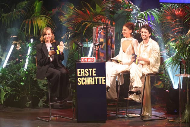 FIRST STEPS 2026 Moderator:innen Malaya Maximilian und Big Audience Award Laudatio: Magdalena Prosteder ( Preisverleihung auf der Buehne bei der FIRST STEPS 2026 Verleihung im Theater des Westens in Berlin Copyright: xEventpressxFuhrx